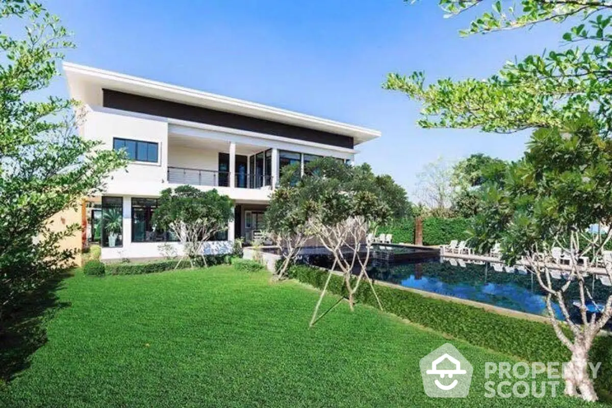 Luxurious modern villa with lush garden and private pool