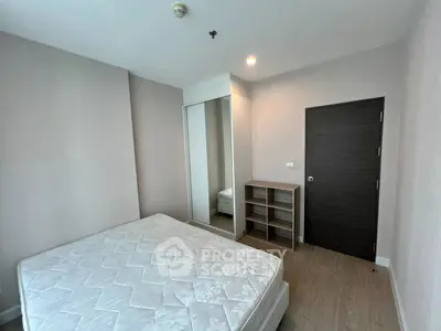 Modern bedroom with minimalist design and ample natural light