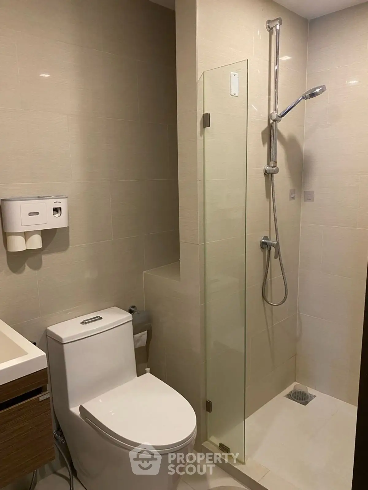 Modern bathroom with sleek shower and toilet design