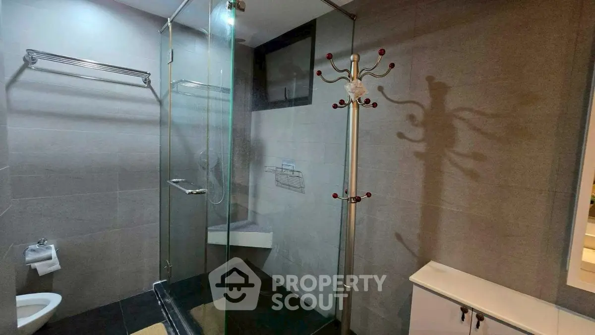 Modern bathroom with glass shower and sleek design