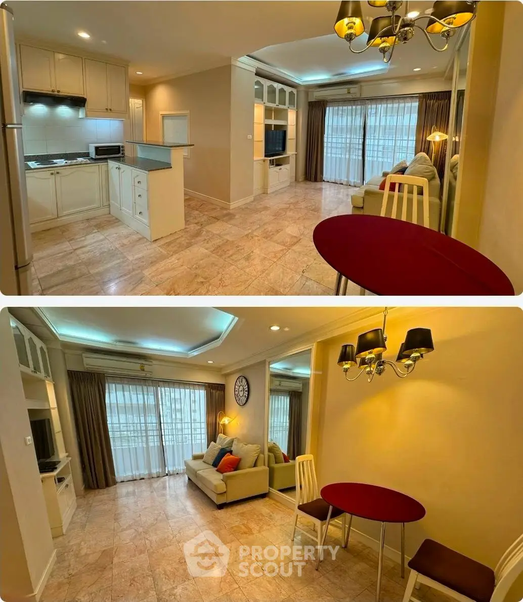 Spacious open-plan living room with modern kitchen and elegant lighting, perfect for entertaining.