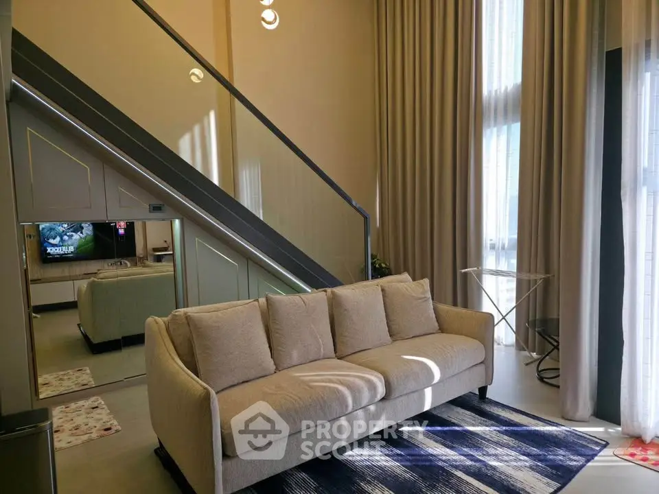 Modern living room with high ceilings and stylish decor