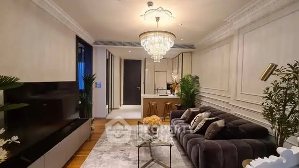 Luxurious living room with elegant chandelier and modern decor