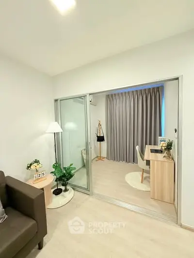 Modern study room with sliding glass doors and elegant decor