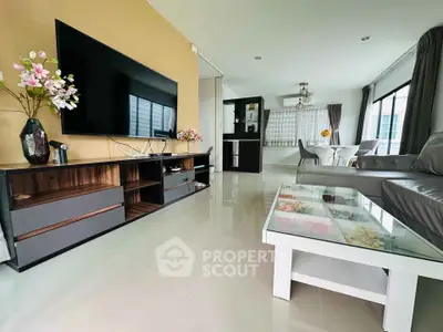 Spacious modern living room with sleek furniture and large windows