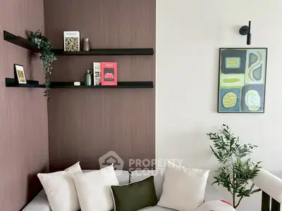 Stylish modern living room with elegant wall art and cozy seating area.