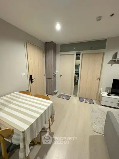 Modern apartment interior with dining area and cozy living space