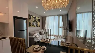 Luxurious modern living room with elegant dining area and chandelier