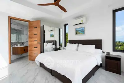 Luxurious bedroom with ensuite bathroom and scenic views
