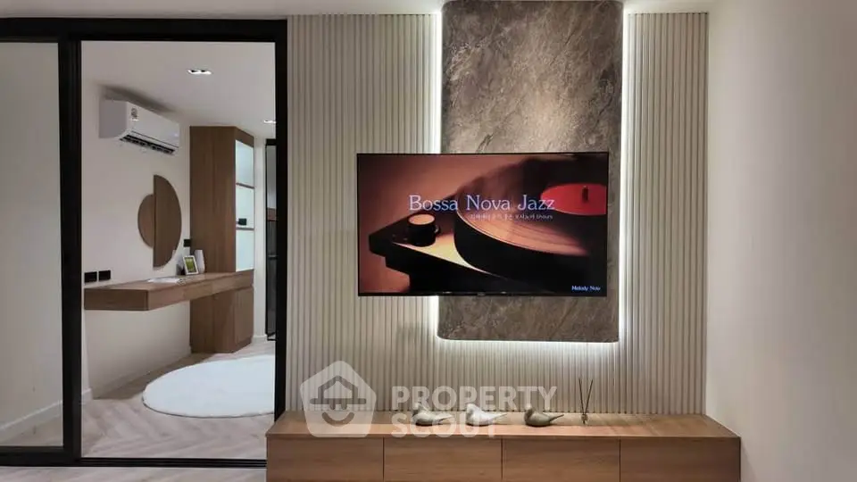 Modern living room with stylish TV setup and elegant decor