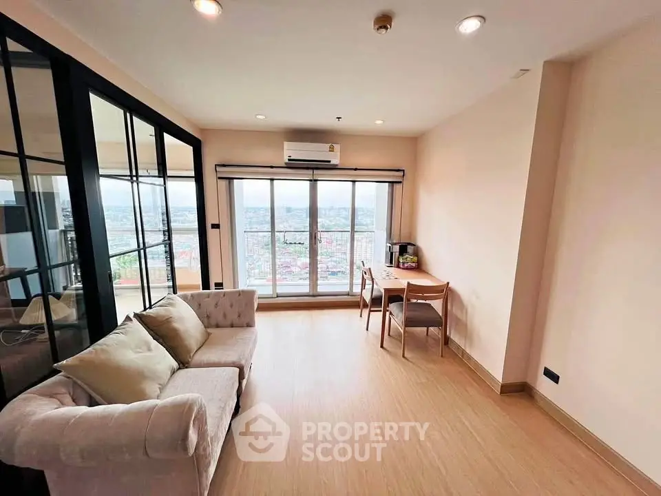 Spacious living room with panoramic city view and elegant furnishings