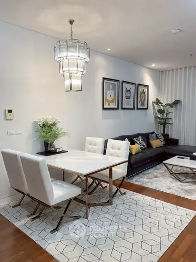 Stylish modern living room with elegant dining area and chic decor