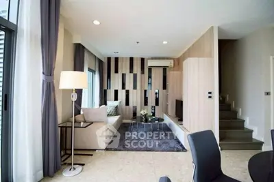 Modern living room with stylish decor and natural light