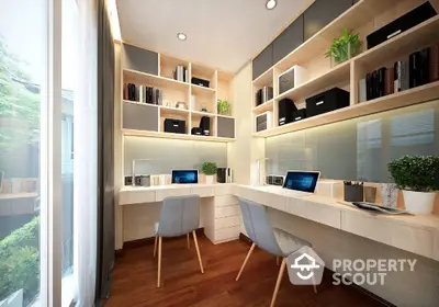 Modern home office with dual workstations and ample natural light