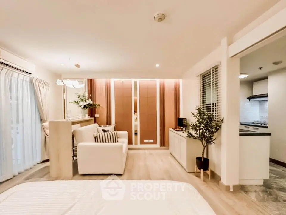 Modern open-plan living room with stylish decor and cozy ambiance