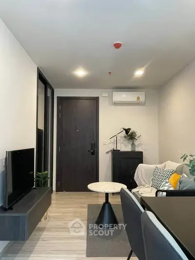 Modern living room with sleek furniture and stylish decor