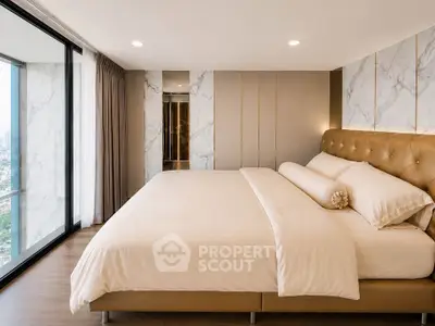 Luxurious bedroom with panoramic city view and elegant decor
