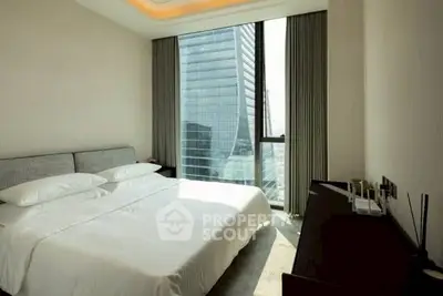 Luxurious bedroom with stunning city view and modern decor