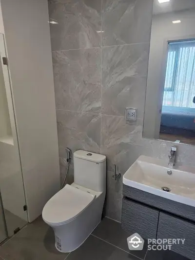 Modern bathroom with sleek fixtures and elegant tile design