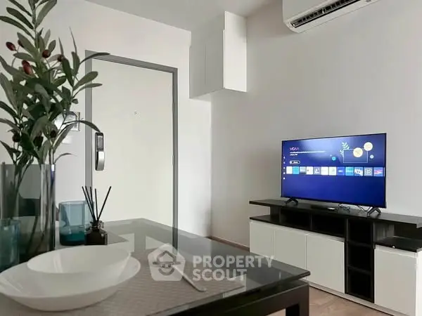 Modern living room with sleek TV setup and minimalist decor