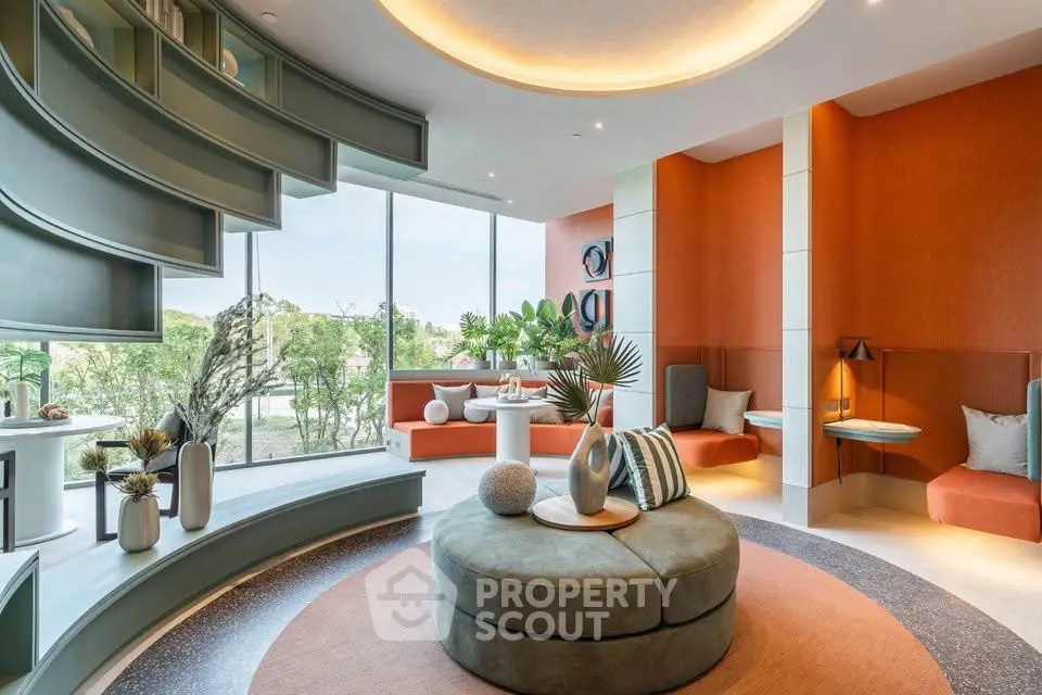 Modern living room with stylish decor and large windows offering a scenic view, featuring unique architectural design.