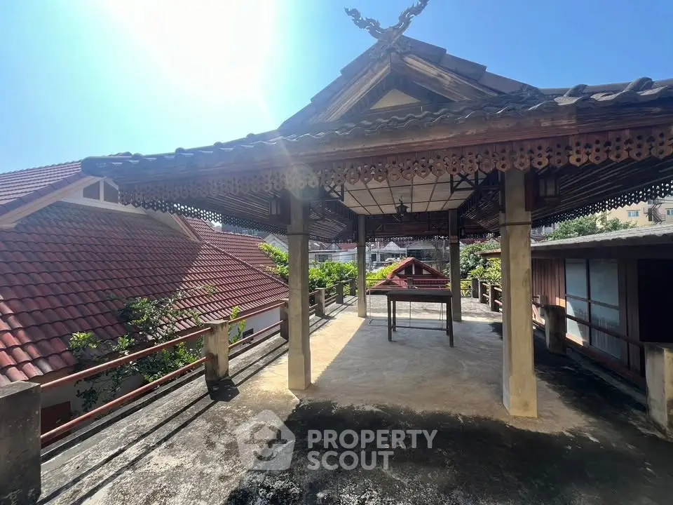 Charming rooftop terrace with traditional architectural design and scenic views.