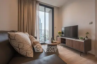 Modern living room with balcony view and stylish furniture