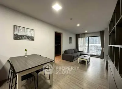 Modern living room with sleek furniture and city view