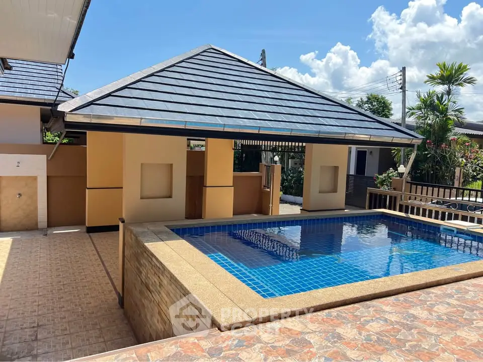 Stunning private villa with a luxurious pool and modern architecture, perfect for relaxation and entertainment.