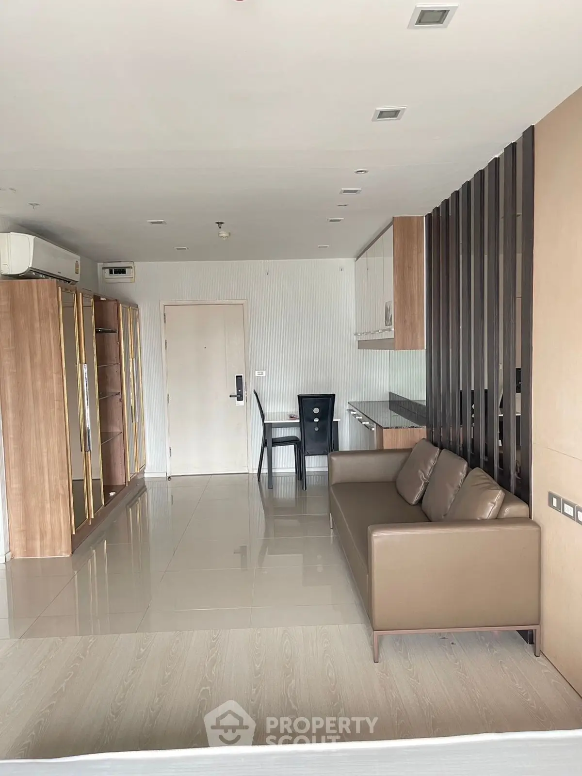Spacious modern living room with sleek furniture and open layout