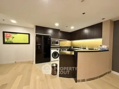 Modern kitchen with sleek appliances and open layout design