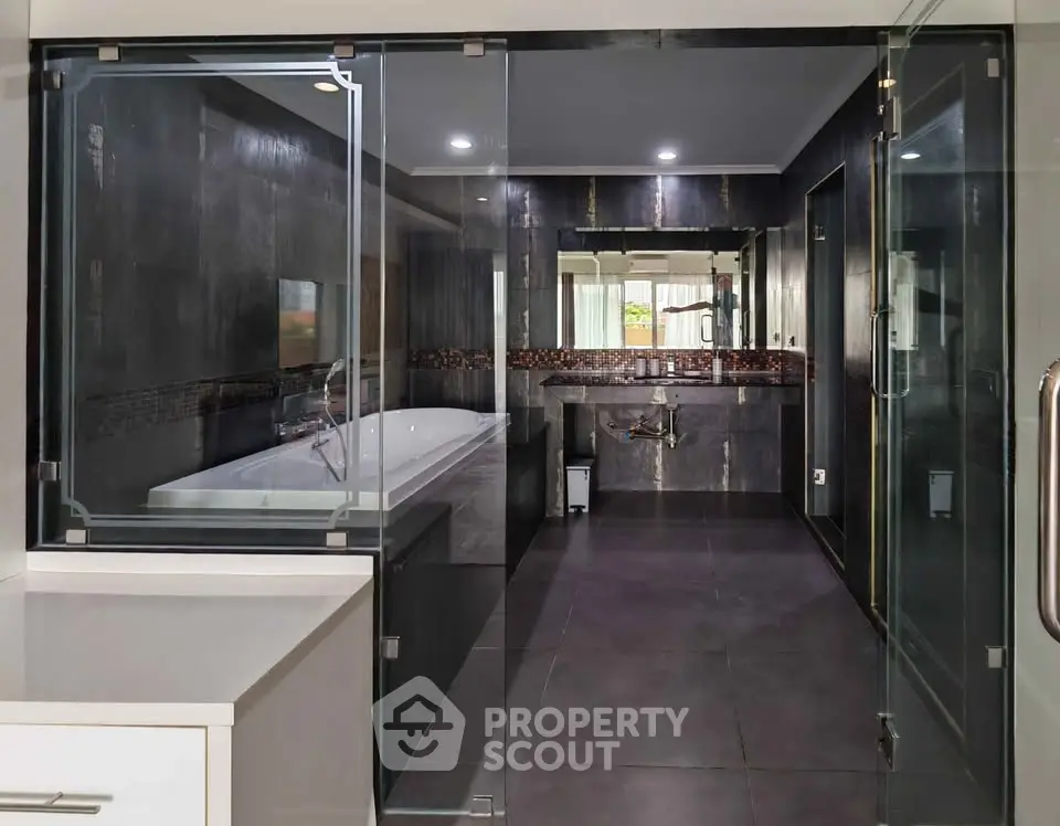 Luxurious modern bathroom with glass shower and sleek design