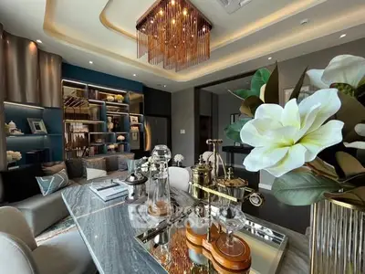 Luxurious modern living room with elegant decor and stunning chandelier