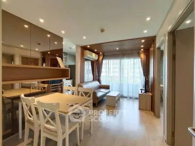 Modern living room with elegant decor and ample natural light