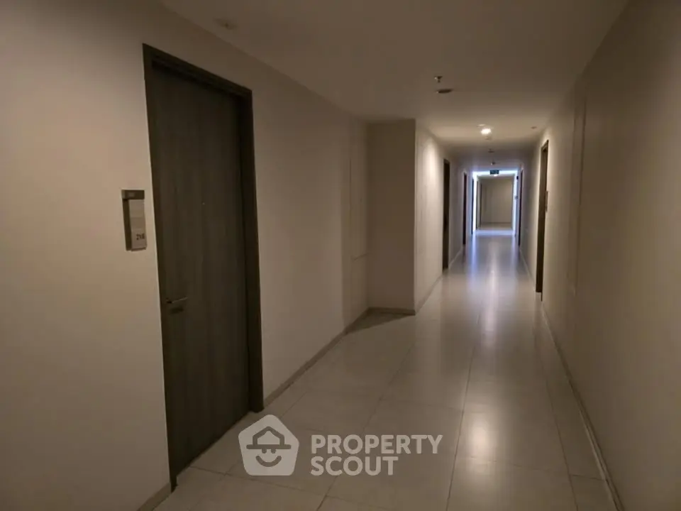 Modern apartment hallway with sleek design and ambient lighting