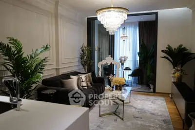 Luxurious living room with elegant chandelier and modern decor