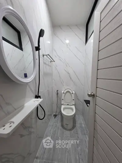 Modern bathroom with sleek design and marble tiles