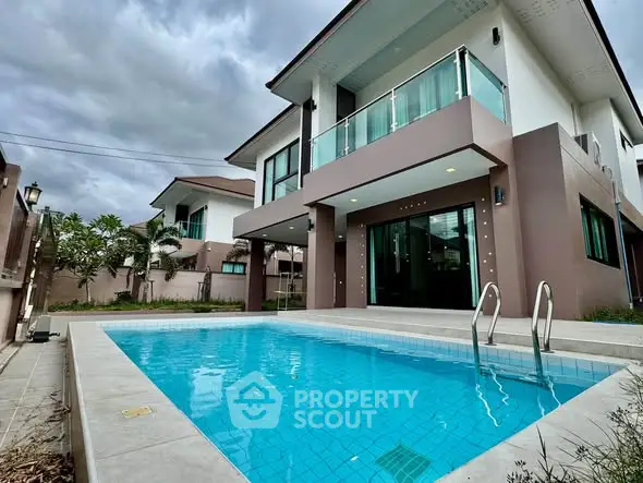 Luxurious modern house with private swimming pool and elegant architecture.