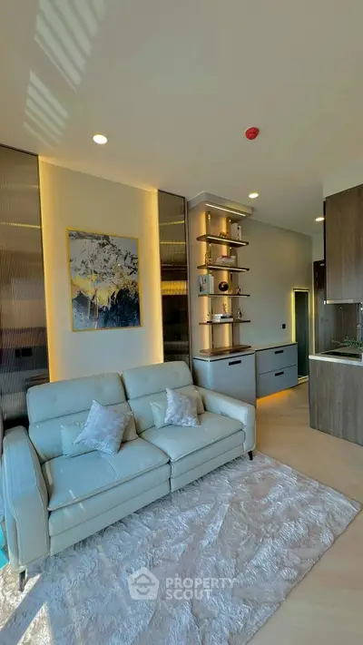 Modern living room with elegant decor and cozy white sofa