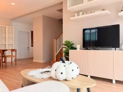 Modern living room with stylish decor and wooden flooring