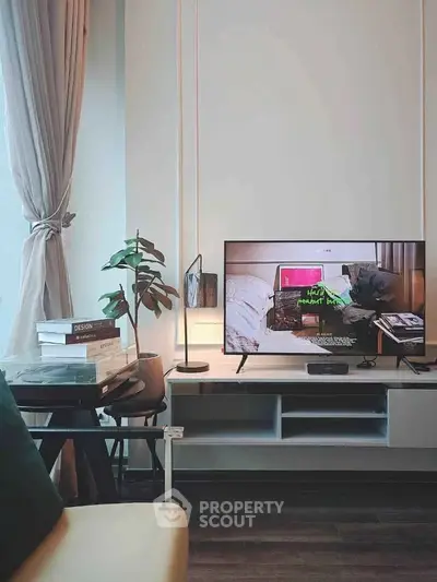 Stylish living room with modern TV setup and elegant decor