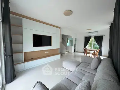 Spacious modern living room with sleek furniture and natural light