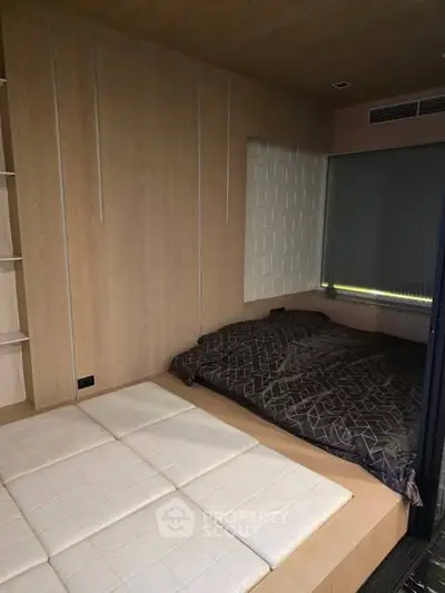 Modern bedroom with minimalist design and cozy bedding