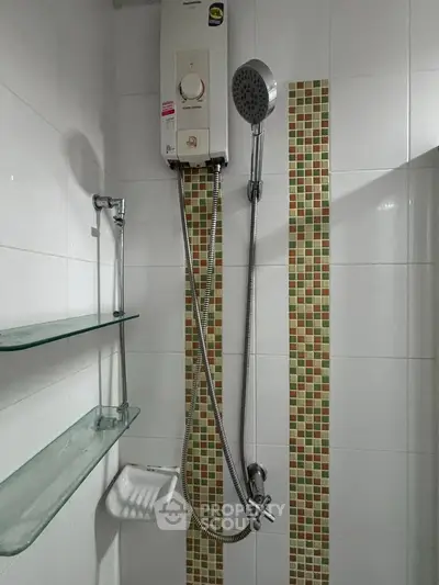 Modern bathroom shower with water heater and stylish tile accents