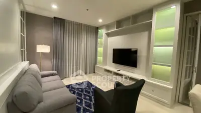 Modern living room with sleek furniture and ambient lighting