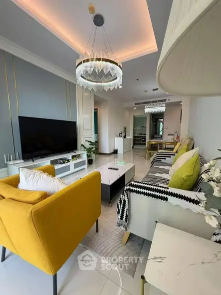 Stylish modern living room with elegant lighting and vibrant decor