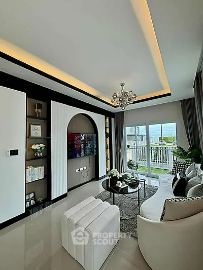 Luxurious modern living room with elegant decor and balcony view