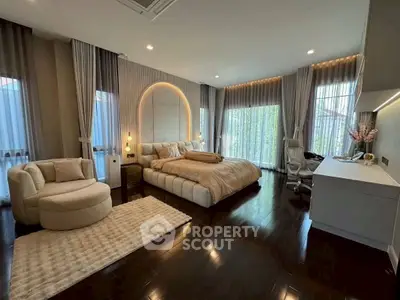 Luxurious bedroom with elegant decor and natural light