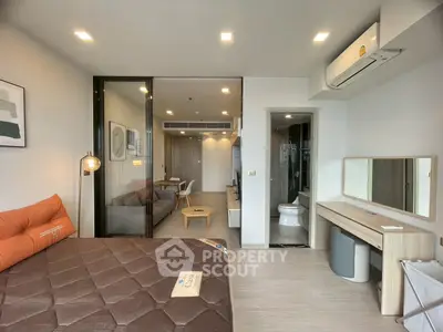 Modern studio apartment with open layout and stylish furnishings