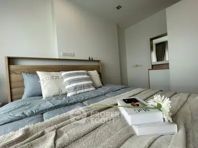 Cozy bedroom with stylish decor and comfortable bedding